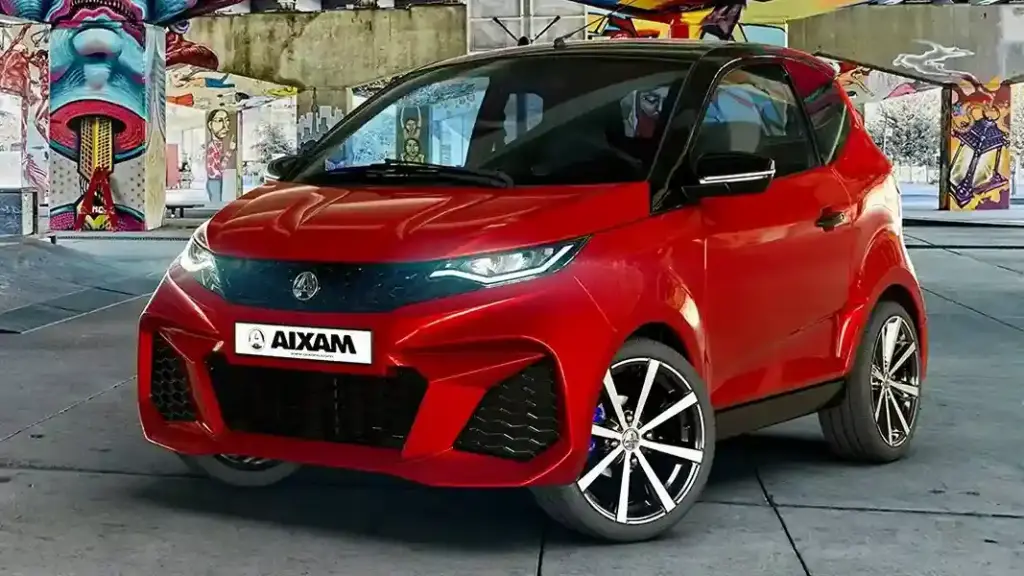 fotografia-oficial-aixam-city-gto-rojo-coche-sin-carnet-en-espacio-urbano-con-graffiti