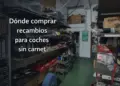 fotografia real de un almacen de recambios para coches sin carnet con estanterias llenas de piezas y repuestos